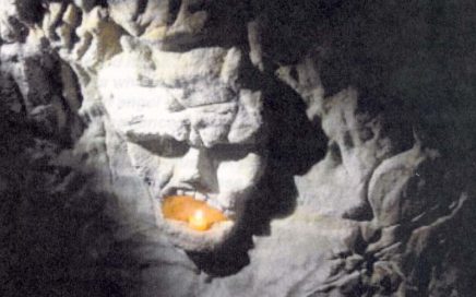 Devil's head carved in sandstone wall of Satan's Cave