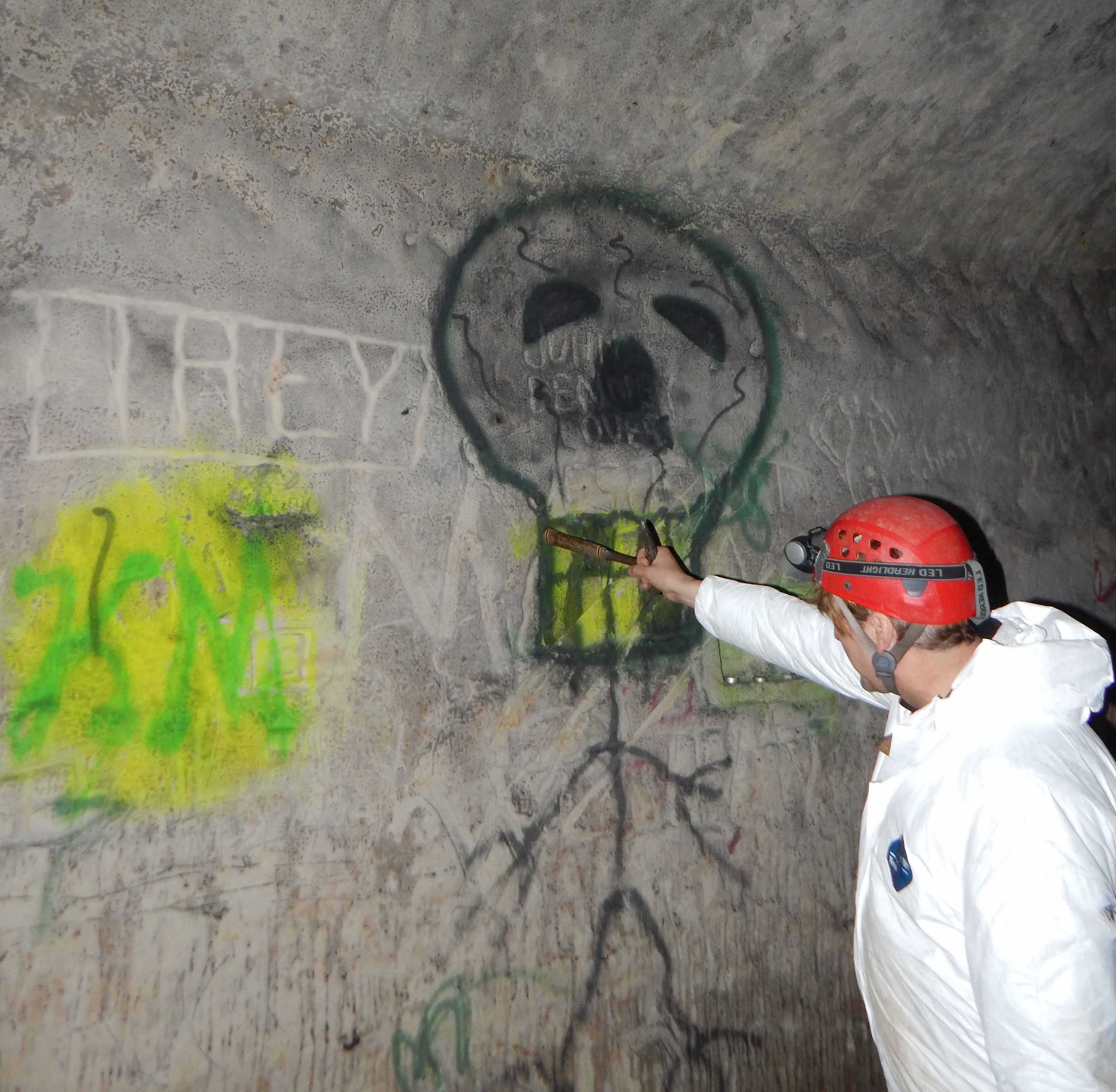 Skull spray painted on walls of Banholzer Cave